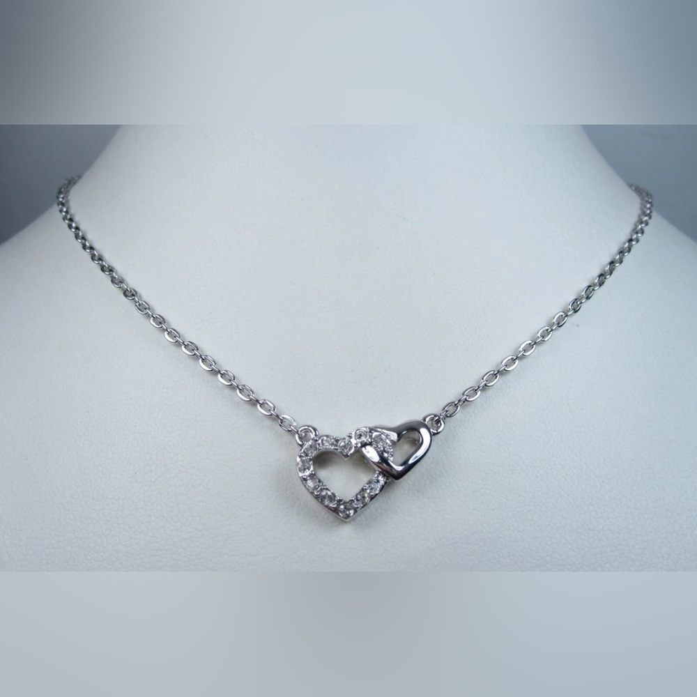 Nina Ricci Rhodium Plated
Pendant with Swarovski Crystals
- 16-78"